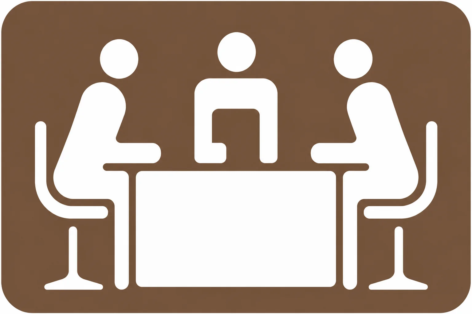 Three people in discussion around a table